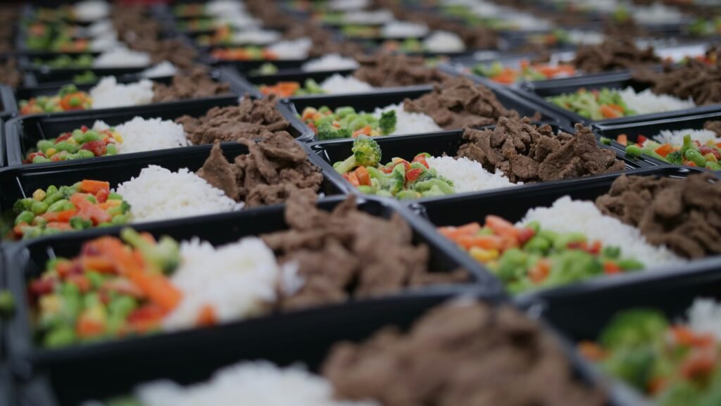 Simple meal prep containers with whole foods for sustainable weight loss